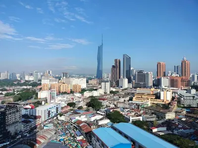 a cityscape of a city with tall buildings at Charming Haven in Kuala Lumpur 100Mb TRX Mall in Kuala Lumpur