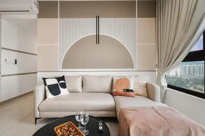 a living room with a couch and a table at M Vertica Cheras by Xuites - 7 pax - Free Netflix - MRT at 500m - 15 mins to KLCC & TRX in Kuala Lumpur