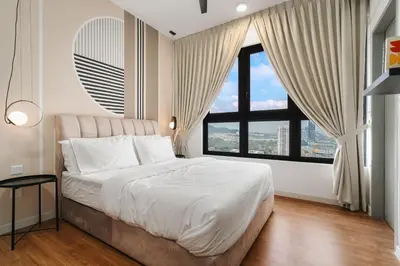 a bedroom with a large bed and a large window at M Vertica Cheras by Xuites - 7 pax - Free Netflix - MRT at 500m - 15 mins to KLCC & TRX in Kuala Lumpur