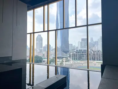 a view of a city from a building with water at OPUS Kuala Lumpur by Scape Stay in Kuala Lumpur
