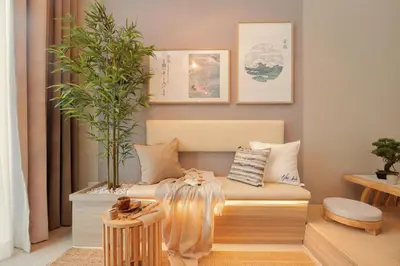 a living room with a couch with a plant at NaiBnB in The Colony by Infinitum in Kuala Lumpur
