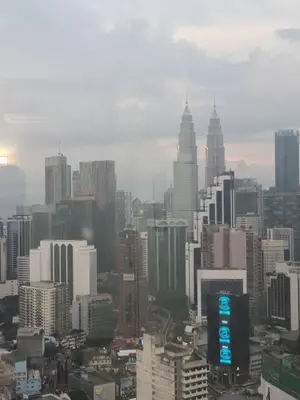 a view of a city with tall buildings at Soho Service Apartment at Times Square KL in Kuala Lumpur