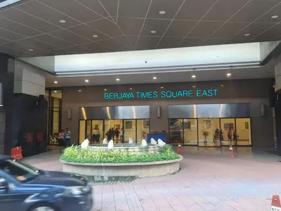 a car parked in front of a shopping center at Soho Service Apartment at Times Square KL in Kuala Lumpur