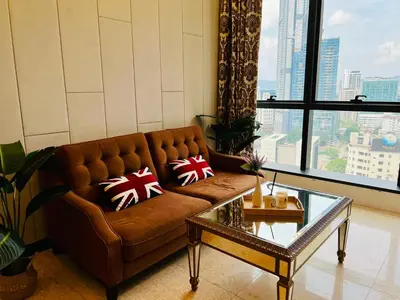 a living room with a couch and a glass table at Dorsett 2BR 6Pax Pavilion Bukit Bintang TRX KLCC in Kuala Lumpur