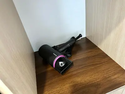 a gun sitting on top of a wooden floor at M Vertica, Sunway Velocity Kuala Lumpur by Rverse Suite in Kuala Lumpur
