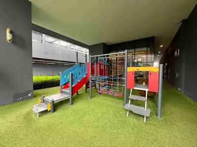 a play room with a playground with a train at Star Resident KLCC By M&T in Kuala Lumpur
