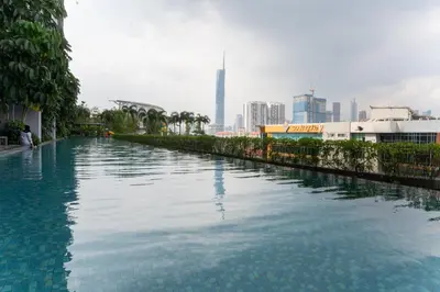 a large pool of water with a city in the background at Premium Skyscraper 1 Bedroom Suite in KL 1-3pax in Kuala Lumpur