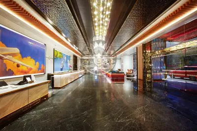 a large room with paintings on the walls at HOME STYLE at Platinum Suites 2 KLCC Twin Towers in Kuala Lumpur