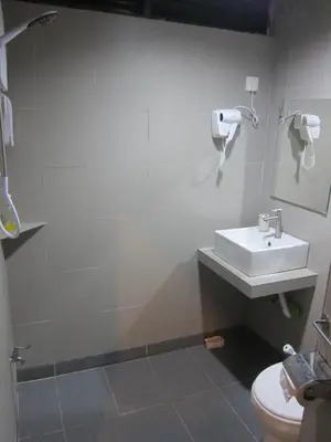 a bathroom with a sink and a toilet at Fahrenheit 88 Suites Bukit Bintang C 3R in Kuala Lumpur