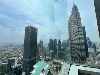 a view of a city from the top of a skyscraper at Sky Suites at KLCC by Mitstay in Kuala Lumpur