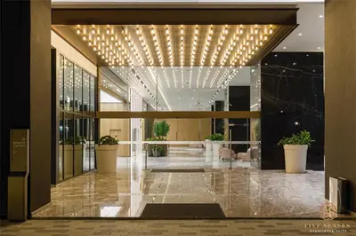 a lobby of a building with a bunch of lights at The Manor Residence KLCC by Five Senses in Kuala Lumpur