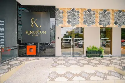 a building with a sign on the front of it at Kingston Hotel 8 - Kuala Lumpur Bukit Bintang in Kuala Lumpur