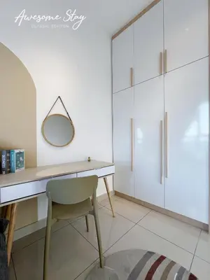 a white desk with a chair and a mirror at Residensi Trion in Kuala Lumpur