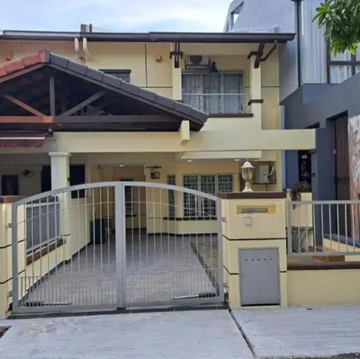 a house with a gate in front of it at Double-story House in Kuala Lumpur in Ampang