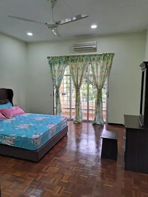 a bedroom with a bed and a large window at Double-story House in Kuala Lumpur in Ampang
