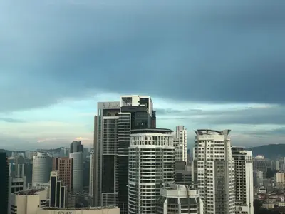 a group of tall buildings in a city at Sky Suites KLCC by Psalm Space exclusively for female travellers in Kuala Lumpur