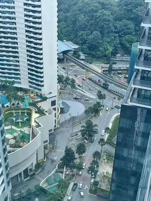 an aerial view of a street in a city with buildings at Summer Suites Studio With Balcony Nearby KL City Centre in Kuala Lumpur