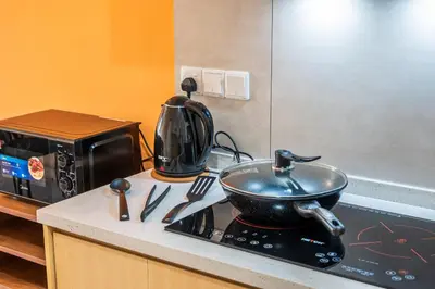 a pot on top of a stove in a kitchen at The Pano by Minsu in Kuala Lumpur