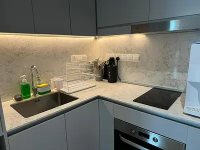 a kitchen with a sink and a counter top at TheOoak 1BRoom cozyhome with balcony in Kuala Lumpur