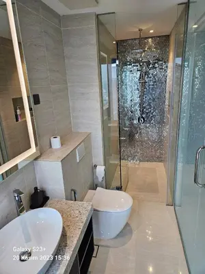 a bathroom with two sinks and a shower at Star Residence T1, 2br Unit Floor 36 in Kuala Lumpur