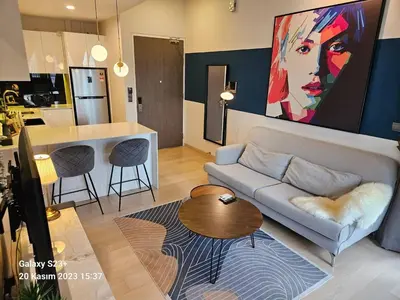 a living room with a couch and a table at Star Residence T1, 2br Unit Floor 36 in Kuala Lumpur