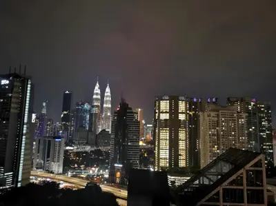 a view of a city at night with at Expressionz KLCC By Sky Homez in Kuala Lumpur