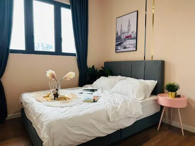 a bedroom with a large bed with white sheets at MVA17#Family Suite 8pax 3 Rooms M Vertica Velocity Mall Cheras IKEA Mytown Short Walk to MRT & LRT Maluri in Kuala Lumpur