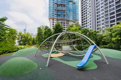 a playground in a park with a slide at NaiBnB in Agile Bukit Bintang - 5 mins walk to TRX in Kuala Lumpur