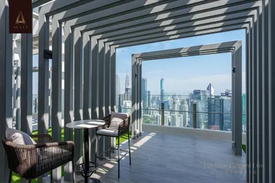 a balcony with a view of the city at Ayatt Bukit Bintang in Kuala Lumpur
