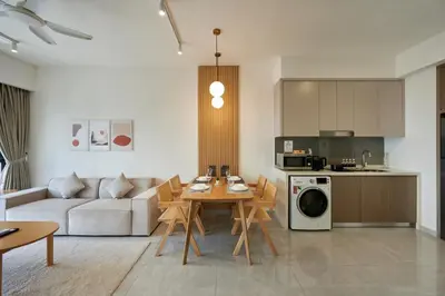 a living room with a couch and a table at Ayatt Bukit Bintang in Kuala Lumpur