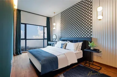 a bedroom with a large bed and a large window at NowHere 2BR 4PAX with Balcony Reizz Jalan Ampang in Kuala Lumpur