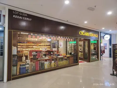 a book store in a shopping mall with a clock at KL Dorsett Damas Grandeur Suite-F-Parking, Self C-In in Kuala Lumpur