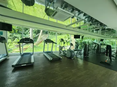 a gym with several treadmills and elliptical machines at KL Dorsett Damas Grandeur Suite-F-Parking, Self C-In in Kuala Lumpur
