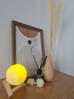 a wooden table with vases and a picture and flowers at KL View 3BedRoom 2carpark MRT Station Cheras Maluri FreeWifi C41 in Kuala Lumpur