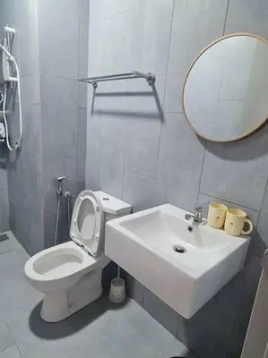 a bathroom with a sink and a toilet and a mirror at KL View 3BedRoom 2carpark MRT Station Cheras Maluri FreeWifi C41 in Kuala Lumpur