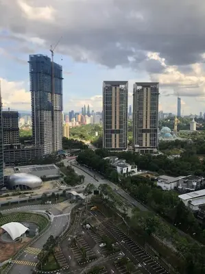a view of a city with tall buildings at Arte Mont Kiara in Kuala Lumpur