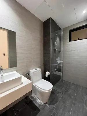 a bathroom with a toilet and a sink and a shower at 2R2B Chan Sow Lin Trion 2 - 6 pax in Kuala Lumpur