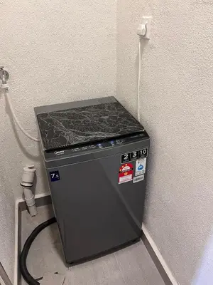 a small stove in a corner of a room at 2R2B Chan Sow Lin Trion 2 - 6 pax in Kuala Lumpur