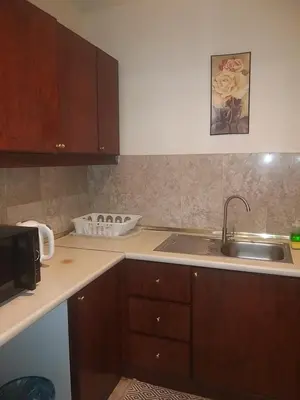 a kitchen with a sink and a counter top at Unique Suite Times Square at Bukit Bintang Kuala Lumpur in Kuala Lumpur