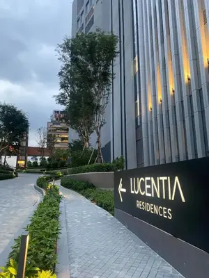 a sign in front of a building at Maxhome Retreat at Lucentia in Kuala Lumpur