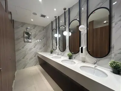 a bathroom with three sinks and four mirrors at The Little Series - Bukit Bintang - TRX View - 4 Pax in Kuala Lumpur