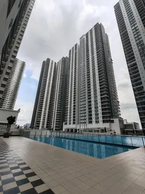 a large building with a pool in front of it at 5min to KL TRX Bukit Bintang for 6paxs in Kuala Lumpur