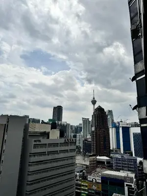 a view of a city with skyscrapers and buildings at Fahrenheit 88 Pavillion Bukit Bintang 3 bedroom in Kuala Lumpur