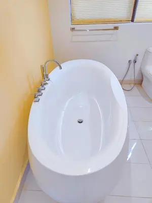 a white toilet in a bathroom with a window at Comfy Stay at Wisma Cosway Pavilion KLCC Bukit Bintang in Kuala Lumpur