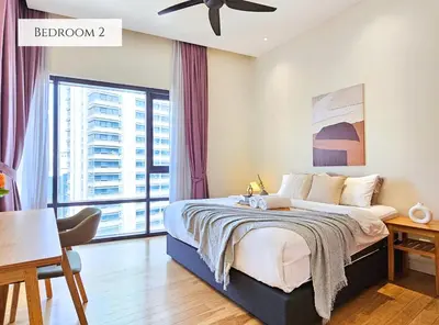 a bedroom with a bed and a large window at St Mary KLCC Luxury 3BR High End Residence 7min Walk to Pavilion and Bukit Bintang by Cloud Host in Kuala Lumpur