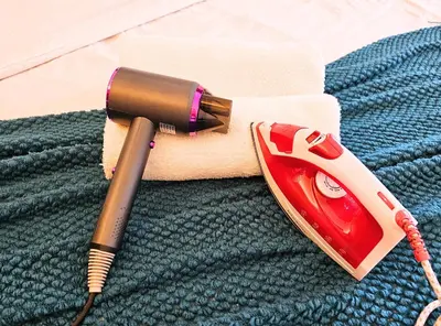 a pen sitting on top of a piece of paper next to a telephone at St Mary KLCC Luxury 3BR High End Residence 7min Walk to Pavilion and Bukit Bintang by Cloud Host in Kuala Lumpur