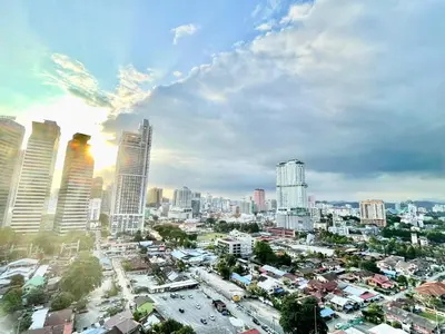 a cityscape of a city with tall buildings at KL CITY CENTRE nearby KLCC in Kuala Lumpur