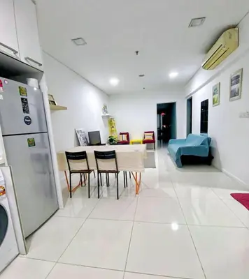 a kitchen and living room with a table and chairs at KL CITY CENTRE nearby KLCC in Kuala Lumpur