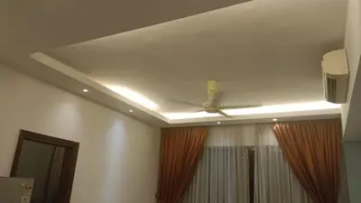 a ceiling with a ceiling fan in a room at Regalia Suite 12-13 in Kuala Lumpur