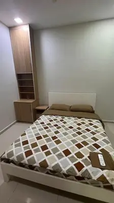 a bedroom with a bed in a room at City Centre KLCC in Kuala Lumpur